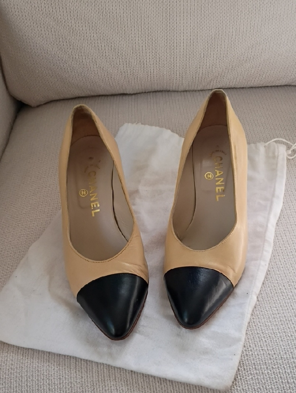 CHANEL Beige Leather Pointed Toe Pumps with Black Cap Toe